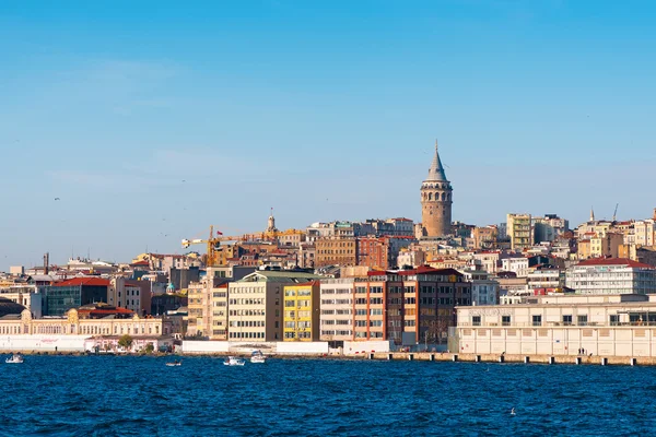 The Galata Tower with apartments and sea around — Stock Photo, Image