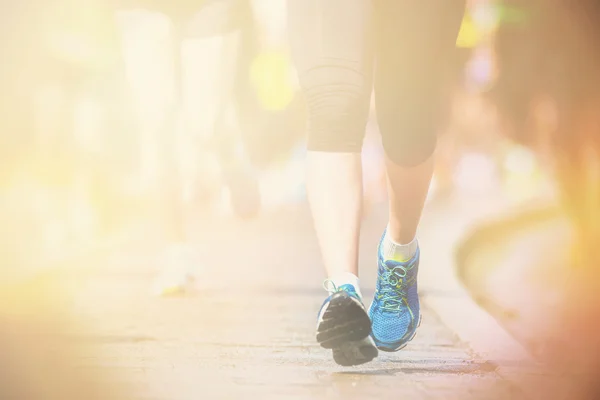 Woman legs and feet closup in warm light — Stock Photo, Image