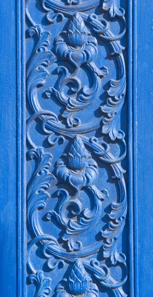 Detail of a ornamented entrance in blue color — Stock Photo, Image