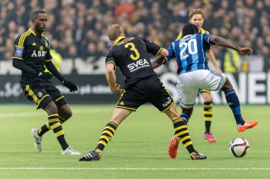 Players fighting over the ball in the soccer game DIF vs AIK at 