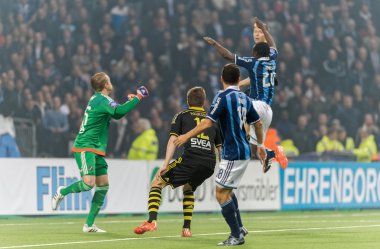 The players fighting over the ball at the goal area DIF vs AIK a