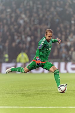Goalkeeper of AIK, Patrik Carlgren kicking the ball in the game 