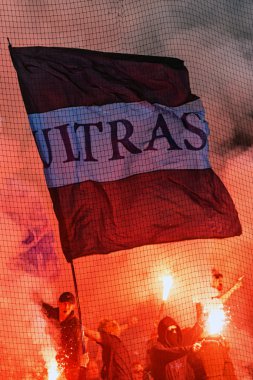 Ultras with flag in halftime and using bengals in the game betwe