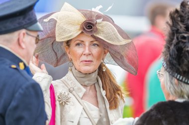 Traditional Hat parade before the horse racing competition