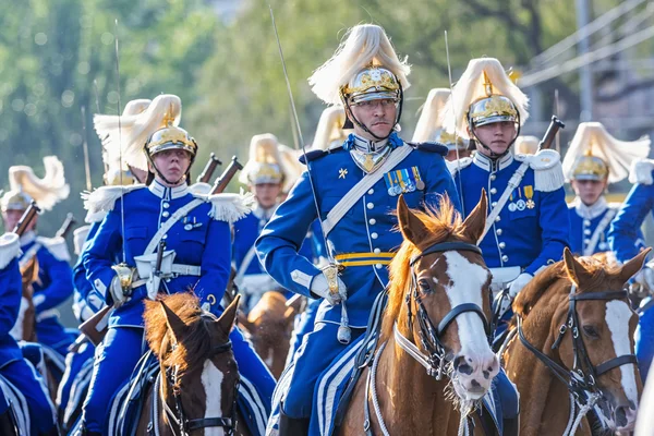 Swedish Royal Guards on horse in blue uniforms at the swedish na — Stok fotoğraf