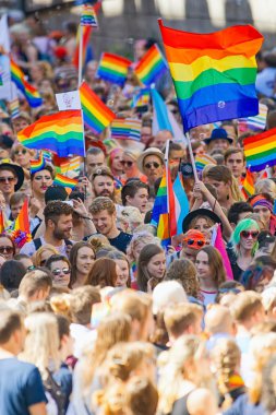 Big crowd walking with the Pride parade