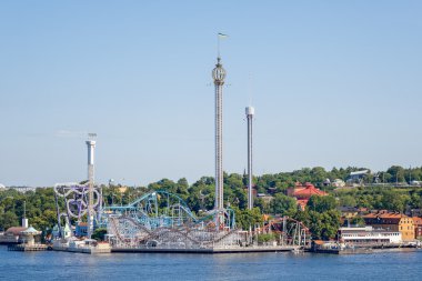 Amusement park Grona Lund from the seaside during summer