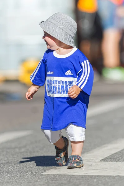One of the youngest runners this year at the Minimil for the you — Stok fotoğraf