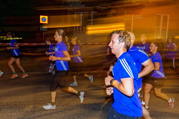 Sideview of male runner with motion blur on the streets of Soder