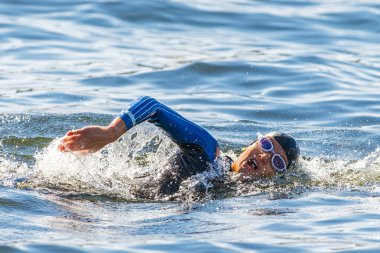 Face of a female triathlete swimming at Womens ITU World Triathl