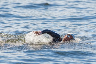 Face of a female triathlete swimming at Womens ITU World Triathl