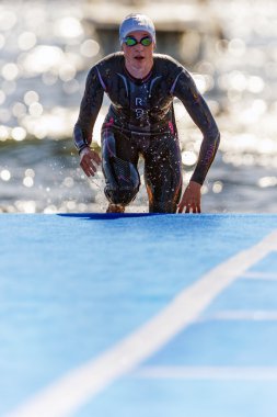 Female triathlete up from the water at the Womens ITU World Tria