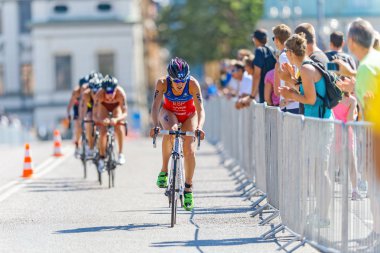Carolina Routier (ESP) leading before a group of cyclists at the