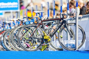 Bikes on a row with equipment after the transition at the Womens