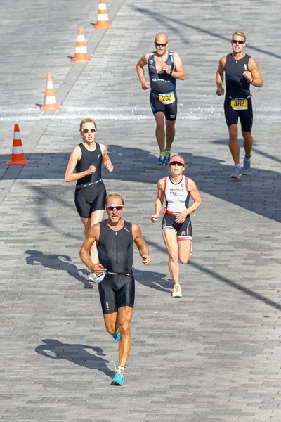 Group of triathletes running from above on stone road at ITU Wor — Stock Photo, Image