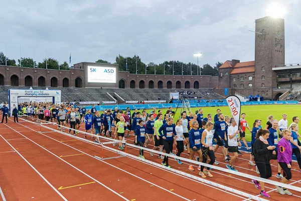 Happy runners walking to the start at the Stockholm Olympic Stad — 图库照片