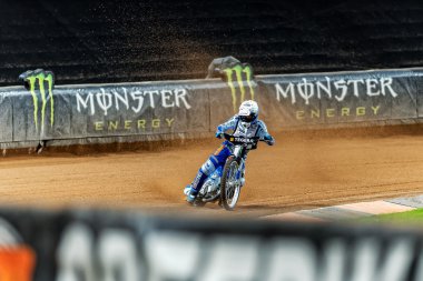Speedway driver in a curve at the TEGERA Stockholm FIM Speedway