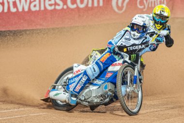 Nicki Pedersen from Denmark leading the heat before Holder at th