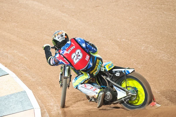 He back of Chris Holder in a curve at the TEGERA Stockholm FIM S — 图库照片