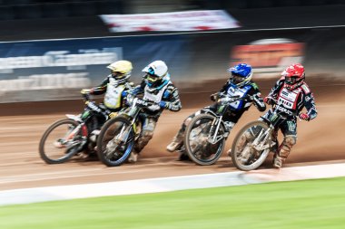 Speedway racers in action with motion blur at the TEGERA Stockho