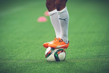 Closeup of soccer legs and feet in the game between Djurgarden a