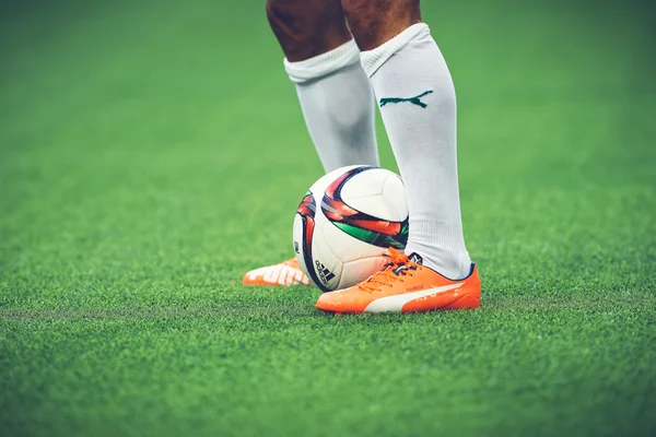 Closeup of soccer legs and feet in the game between Djurgarden a