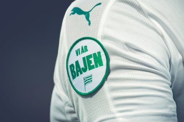 Hammarby emblem at the soccer game between the rivals Djurgarden