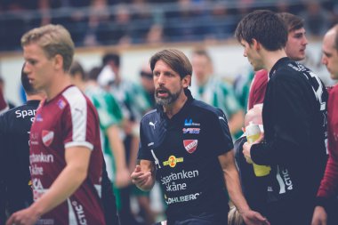 Trainer Tomas Axner after a timeout at the Handball game between