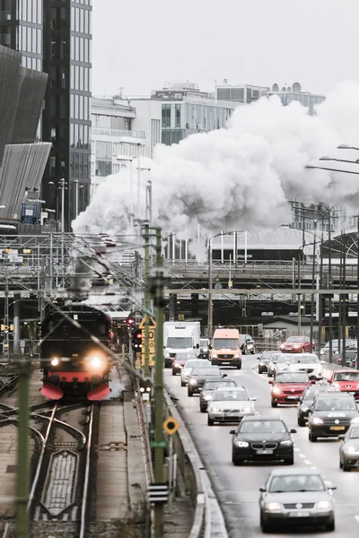 Vintage stoomtrein vertrekken op Stockholm Centraal station — Stockfoto