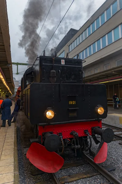 Front view of an old vintage steam train arriving at Stockholm c