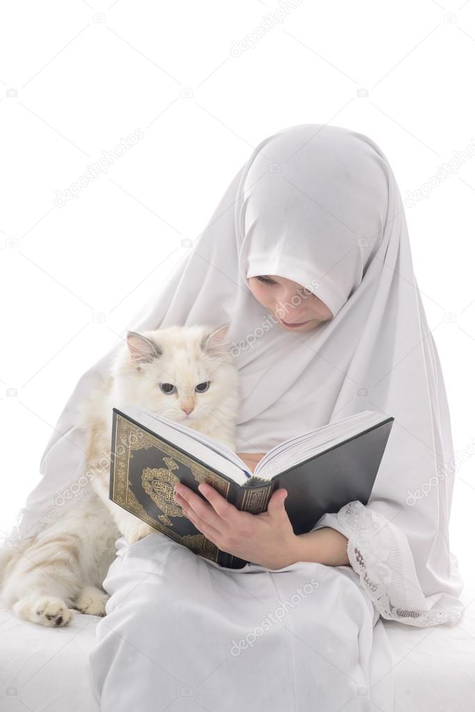 Muslim Girl and Cat Reading Holy Book