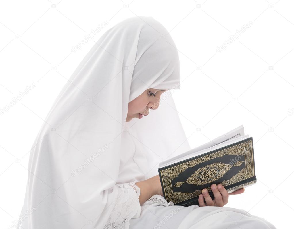 Little Young Muslim Girl Reading Quran Holy Book