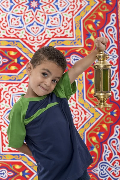 Menino jovem adorável com lanterna Ramadan na mão — Fotografia de Stock