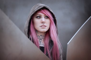 woman with pink hair piercings and tattoos clipart