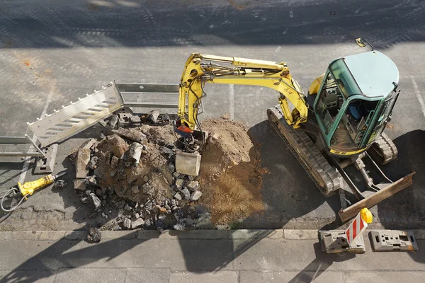 Obras de carretera con excavadora —  Fotos de Stock