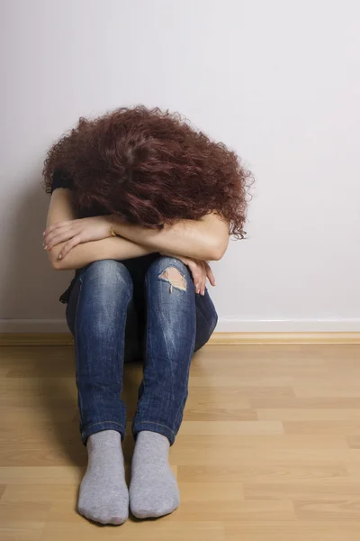 Sad depressed young woman hiding her face — Stock Photo, Image