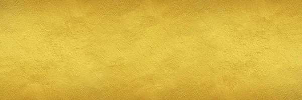 Getextureerde muur geschilderd met gouden kleur - brede banner of header formaat achtergrond — Stockfoto