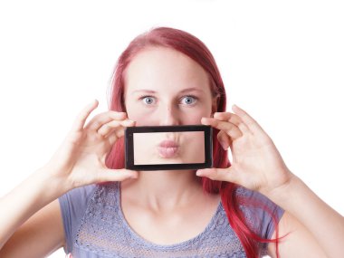 woman messing around with camera phone clipart