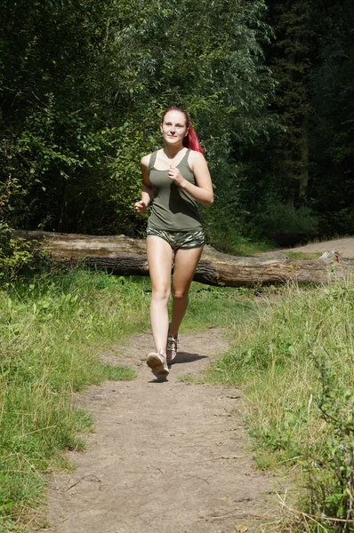 Young woman jogging — Stock Photo, Image