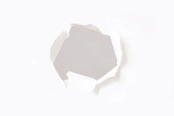 Buraco na parede de papel — Fotografia de Stock