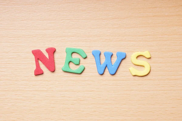 News in foam rubber letters — Stock Photo, Image