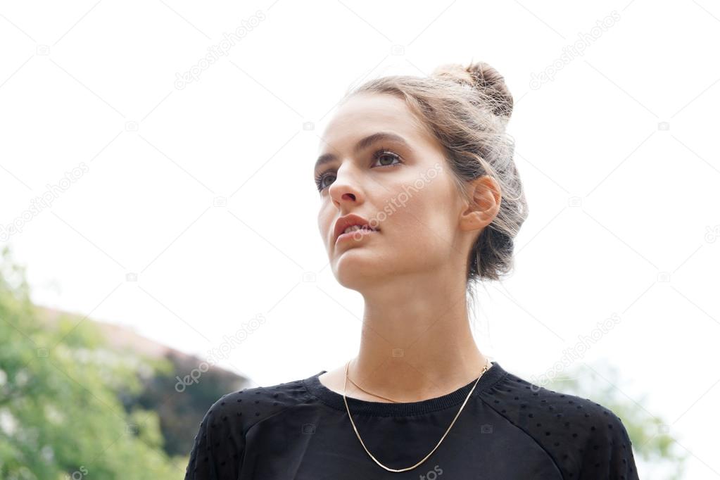 young woman gazing into distance