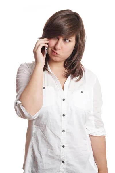 Mädchen schmollt am Telefon — Stockfoto