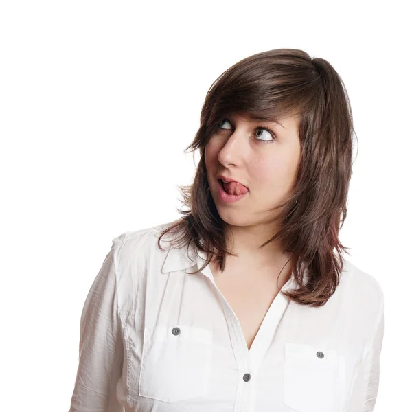 Woman licking lips and looking up — Stock Photo, Image