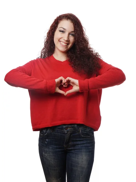 Girl making heart shape with her hands — Stock Photo, Image