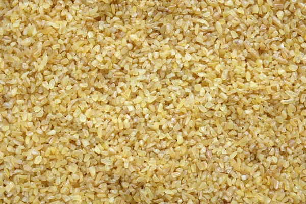 Bulgur wheat background — Stock Photo, Image