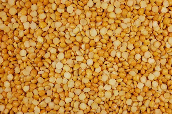 Yellow split peas background Stock Picture