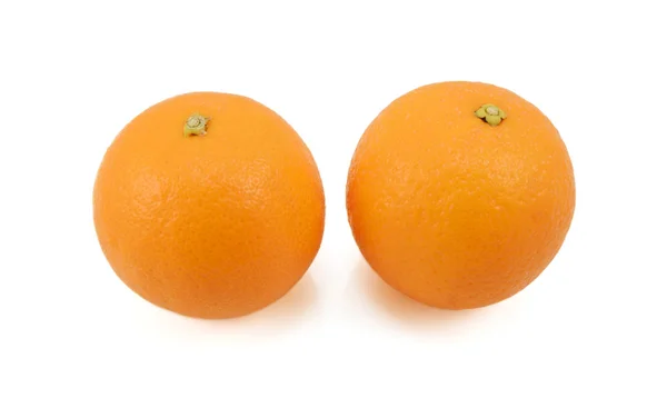 Dwa zupełnie dojrzałych pomarańczy — Zdjęcie stockowe