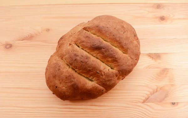 Freshly baked loaf of multi seed malted bread — Stock Photo, Image