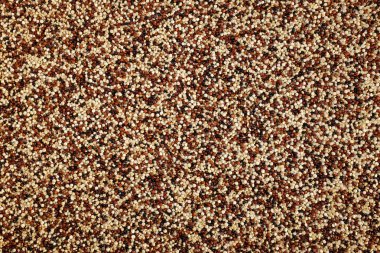 Karışık kırmızı, beyaz ve siyah quinoa arka plan 